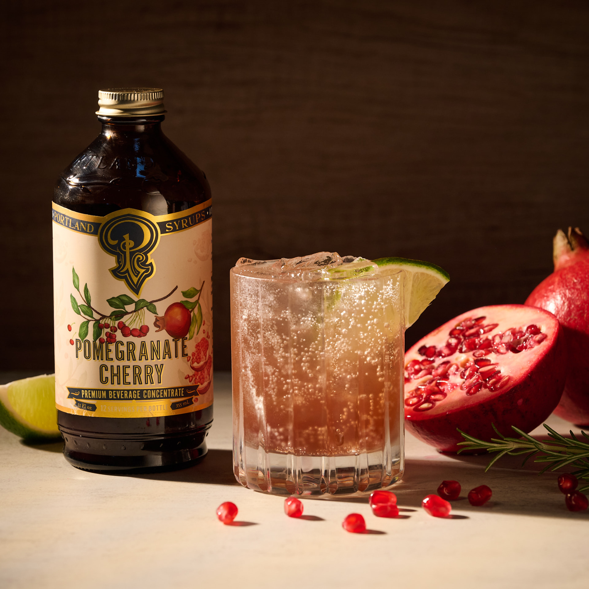 Pomegranate cherry fizz cocktail with fresh pomegranate