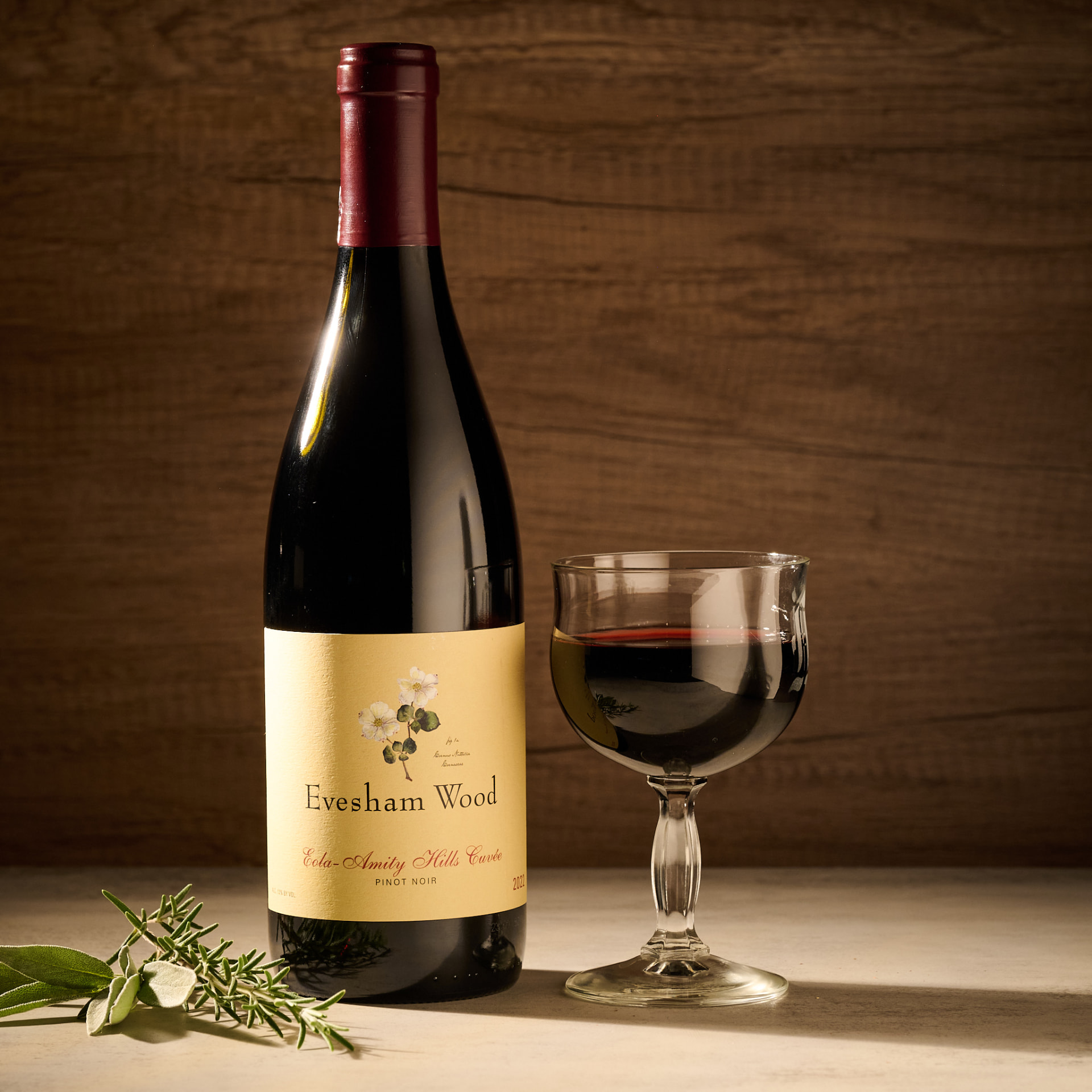 Evesham Wood Eola-Amity Hills Pinot Noir with a glass of red wine